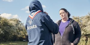 two-volunteer-leaders-chatting-outdoors-2-jpg